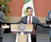 El presidente de M&eacute;xico, Enrique Pe&ntilde;a Nieto, exultante tras la recaptura. Fotos: AFP