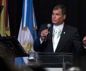 El presidente Rafael Correa durante una conferencia en la UNiversidad de Quilmes. Foto: AFP