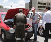 Representantes de patios de compra venta de autos de Quito se capacitaron para evitar adquirir carros adulterados. Foto: Alfredo Lagla / ÚN